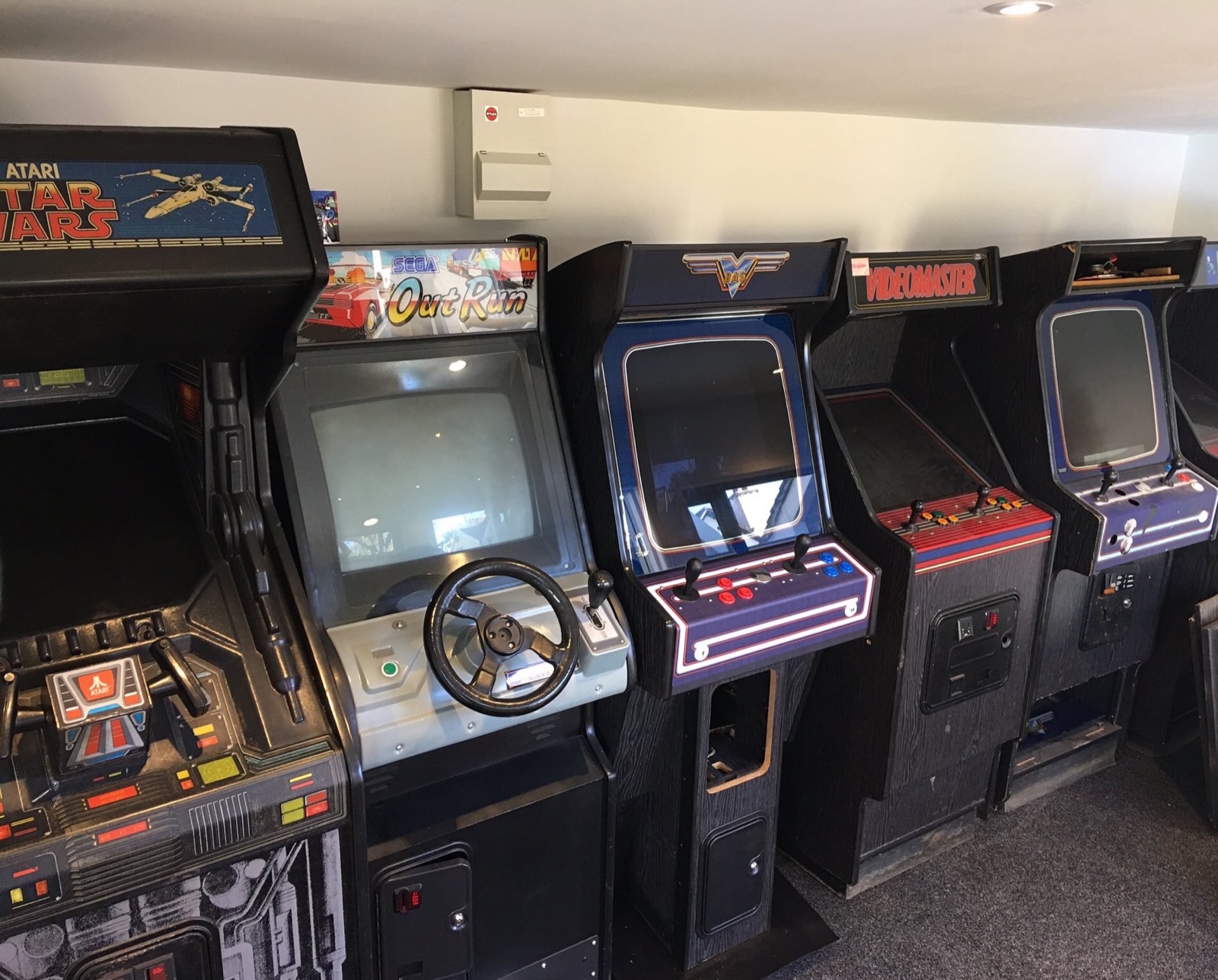The Arcade Shed with carpet tiles fitted and cabinets moved in